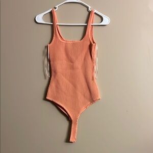 Orange Ribbed Kids One Piece